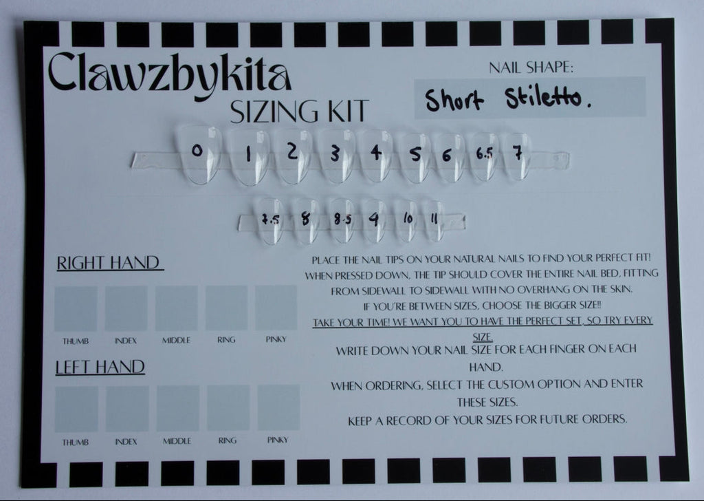 A Clawzbykita nail shape sizing kit card on a light gray background. The white card features a black border, labeled 'Clawzbykita NAIL SHAPE SIZING KIT' with a hand-written note indicating 'Short Stiletto.